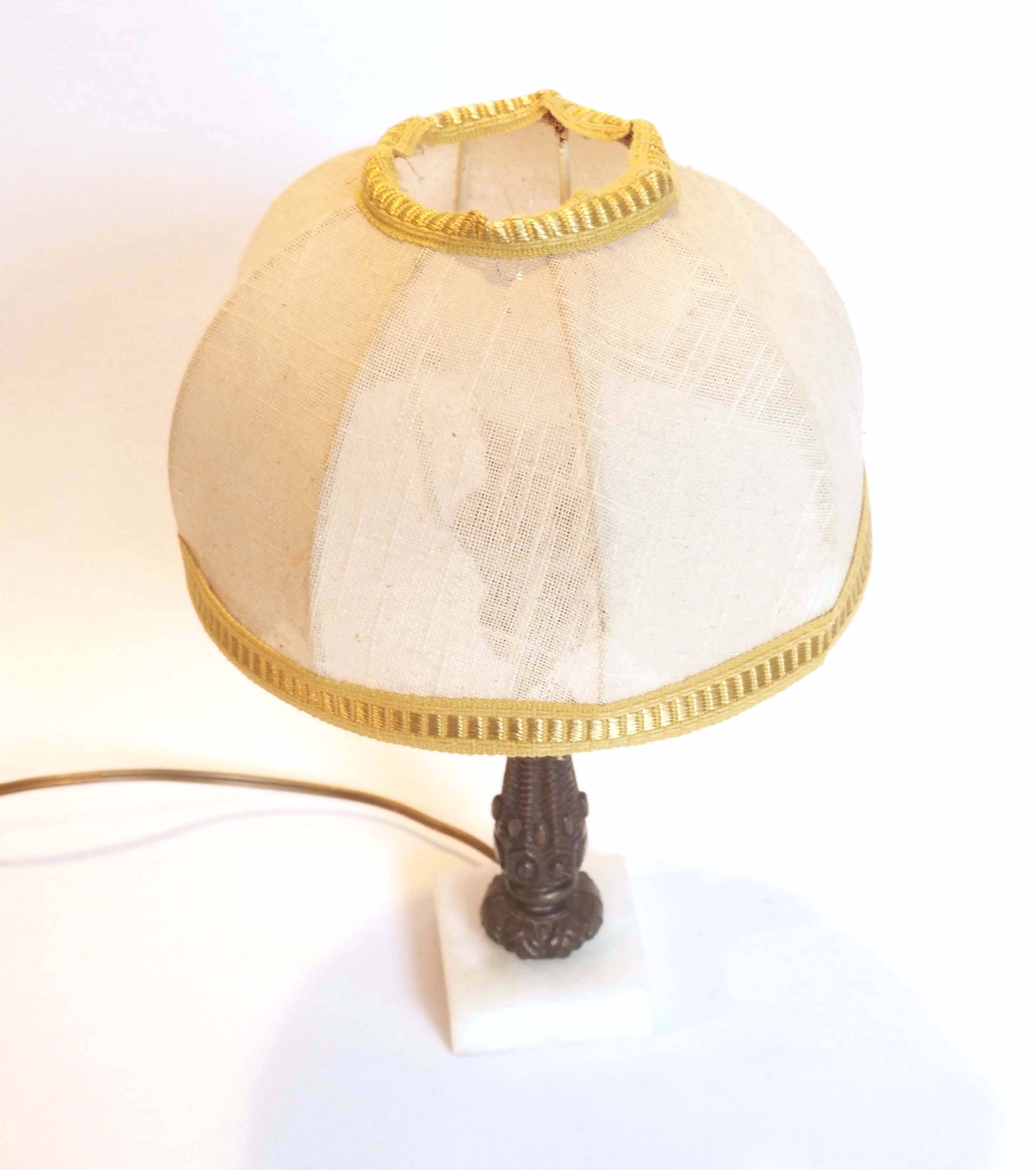Small bronze foot lamp