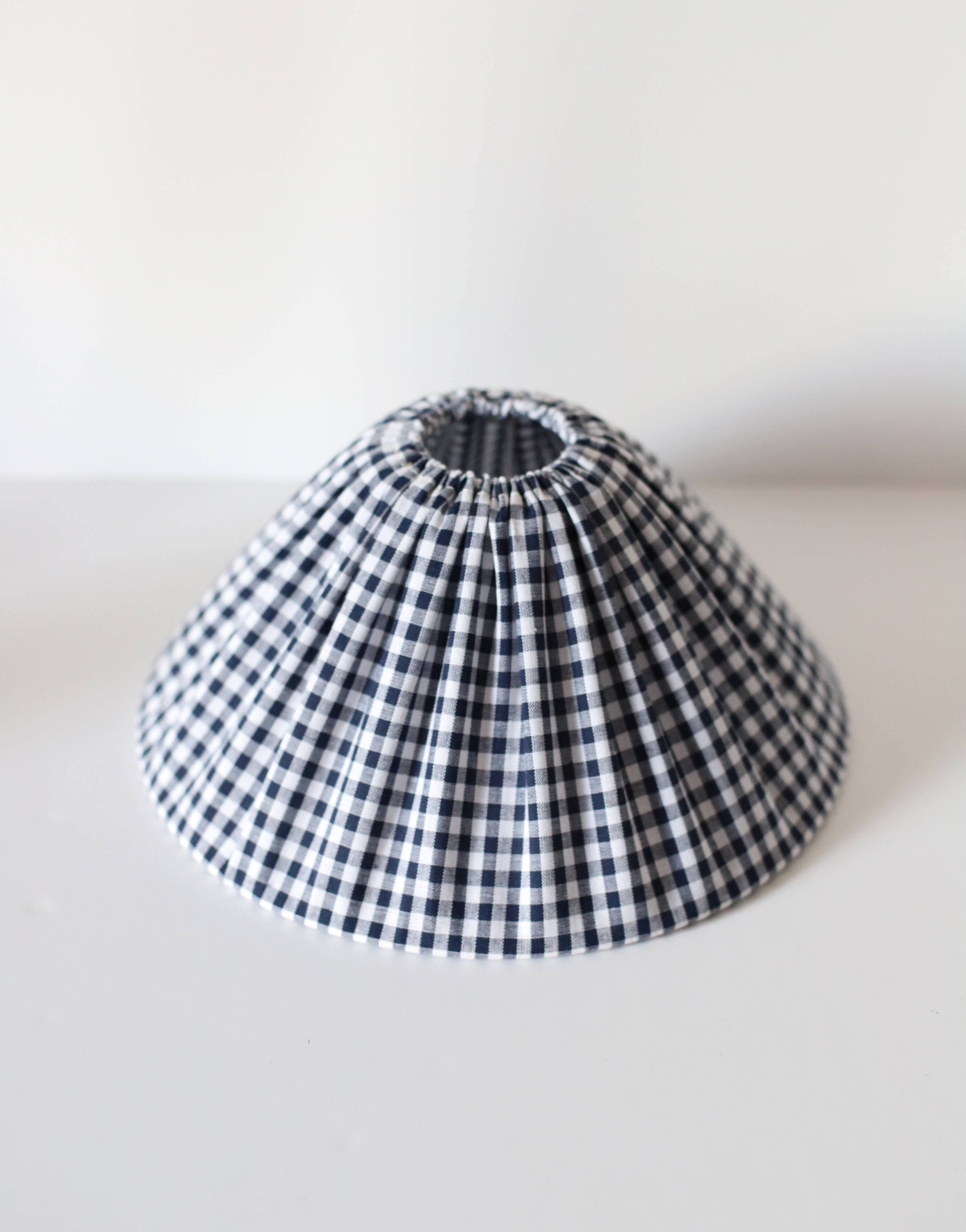 Table lamp with a base in Alsatian stoneware and a pleated gingham lampshade