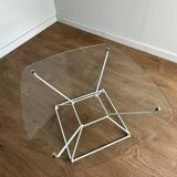 Glass coffee table with steel legs
