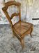 Chaise ancienne style Louis XV en bois et assise cannée