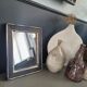 Antique black and gold wooden mirror