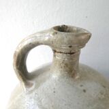Old bonbonne in glazed stoneware