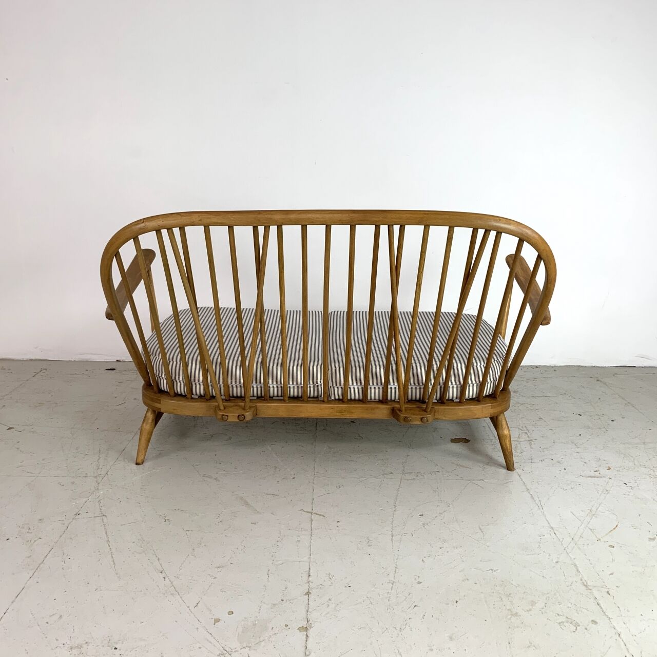 Vintage ercol windsor 2-seater sofa padded in French tick