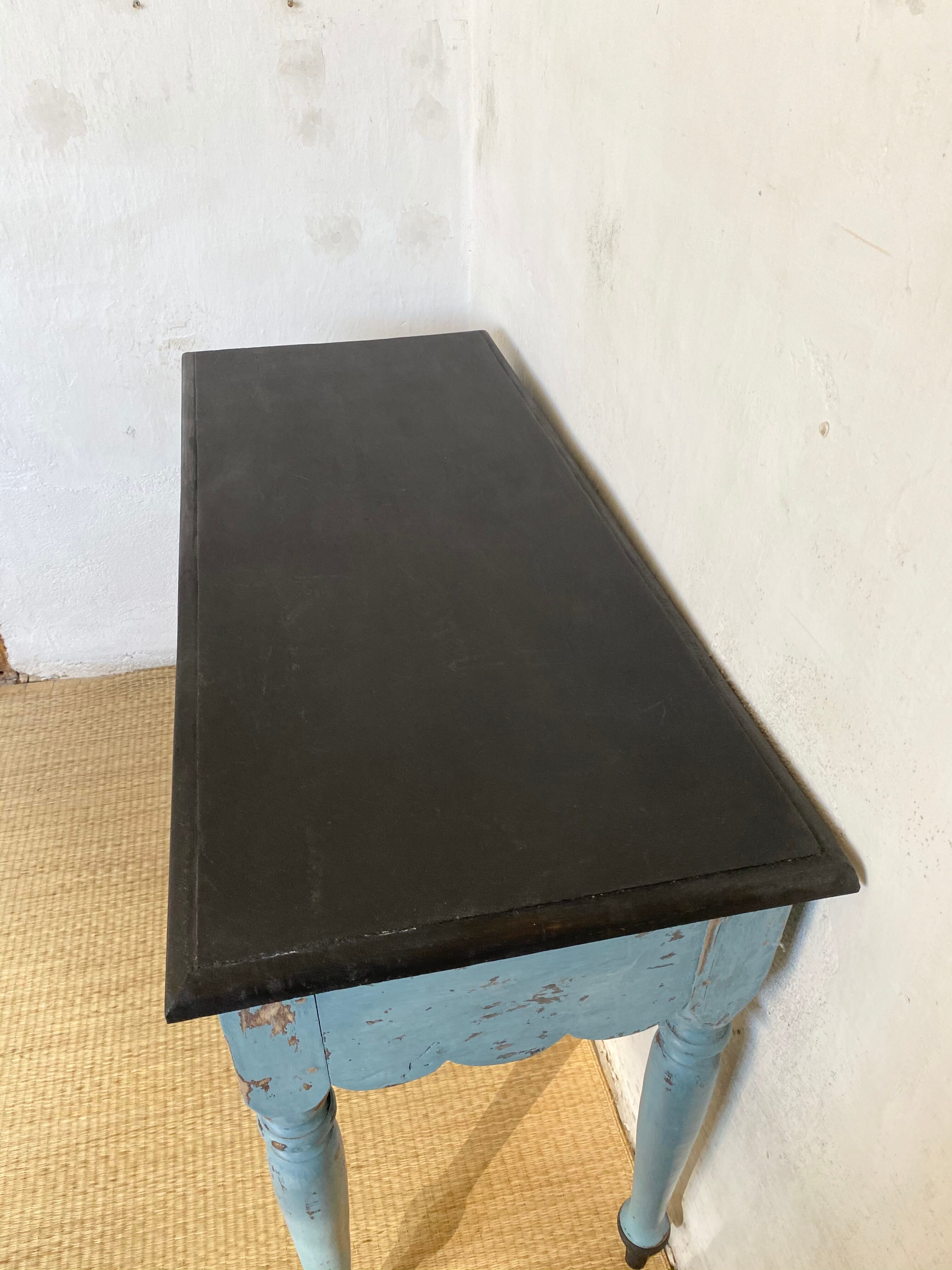 Scalloped console table