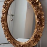 Old mirror in gilded wood late nineteenth