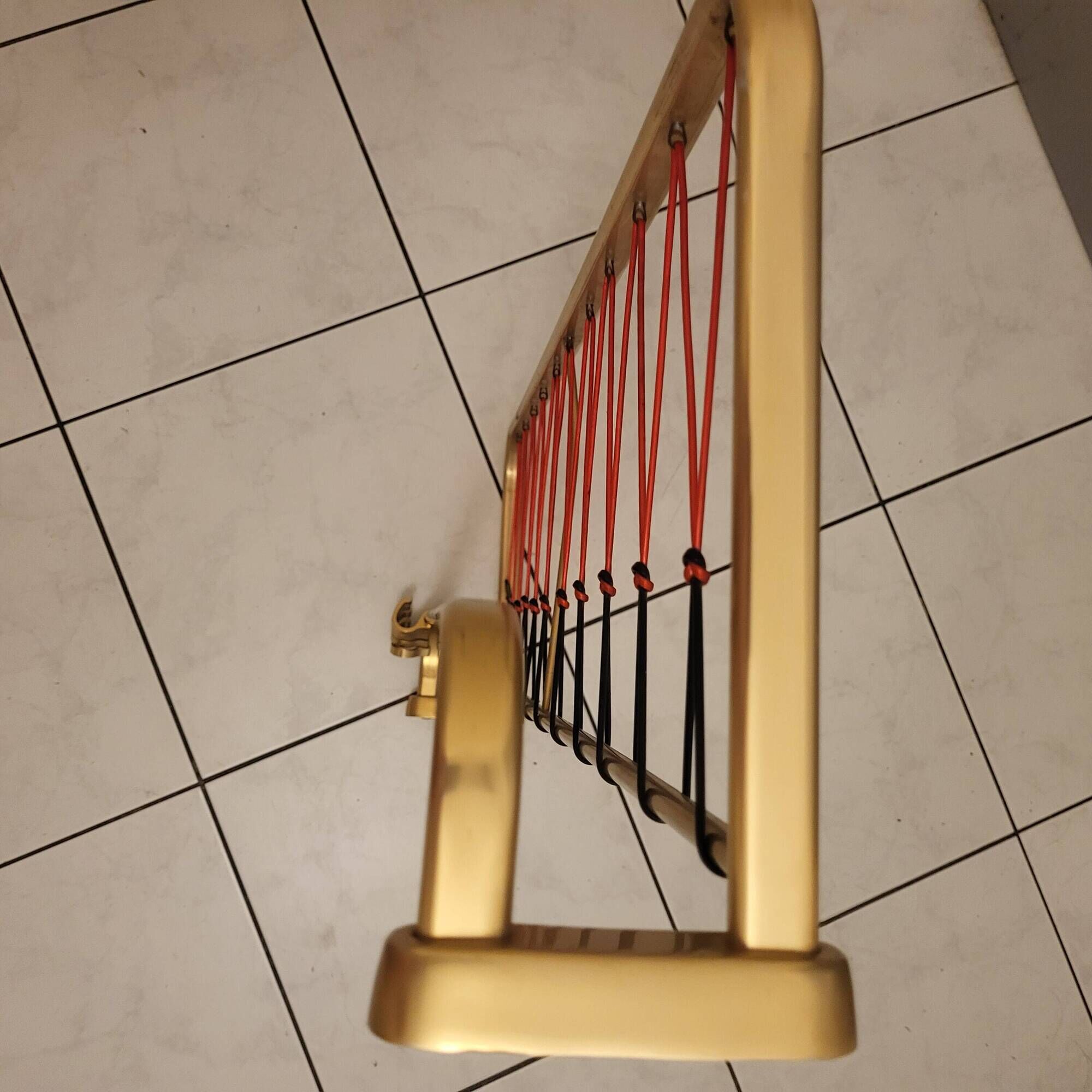 Wall coat rack, golden aluminium coat hooks and scoubidou.