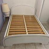 White lacquered bed with gold border with box