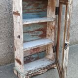 Old small wooden wardrobe with glass door