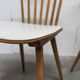 Pair of Baumann Menuet chairs, Honey patina, White skai seat