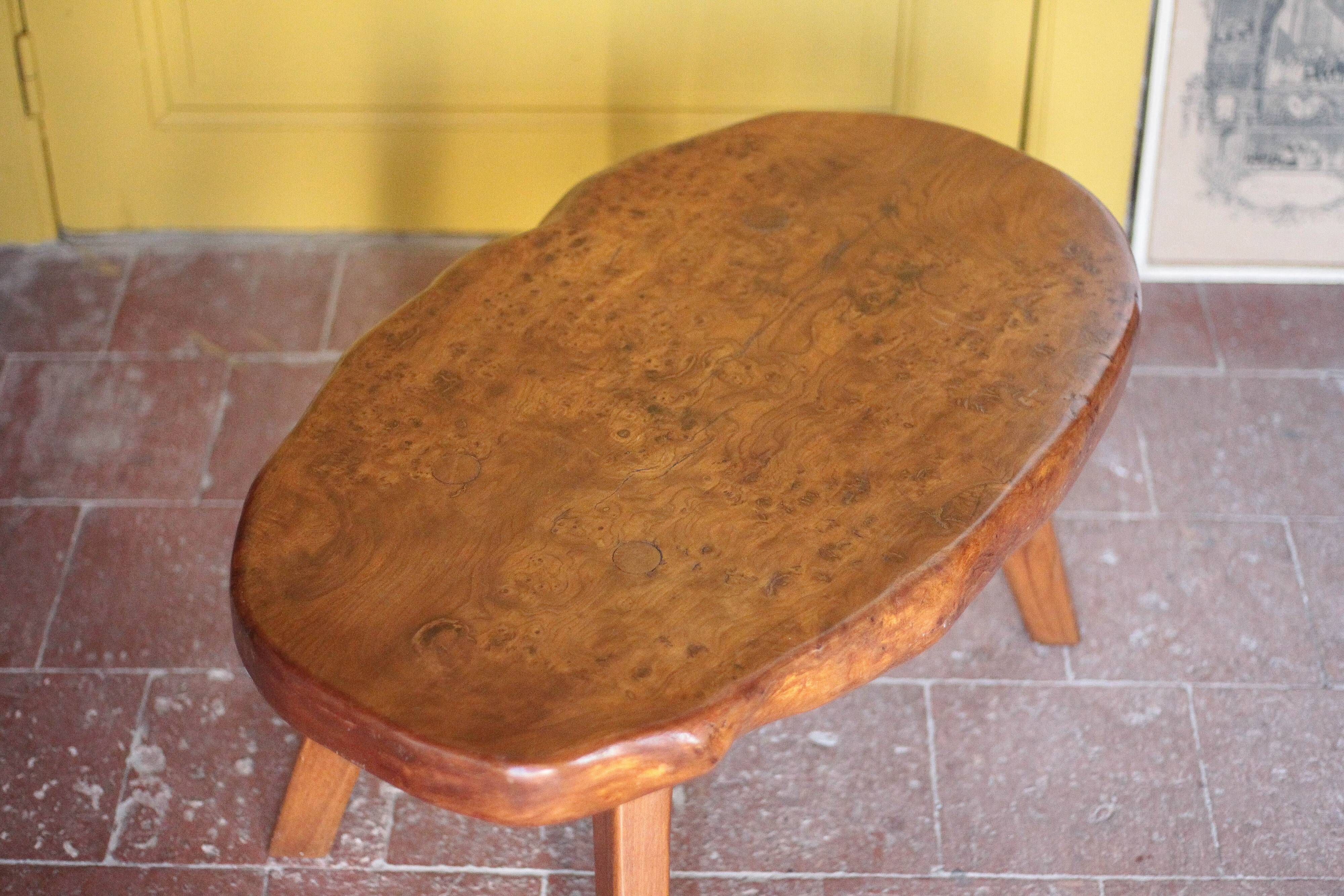 Brutalist coffee table made of elm burl, interior decor, living room table.