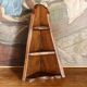 Small brutalist corner shelf in solid oak.