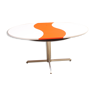 Ying-Yang round orange extendable dining table, 1970s.