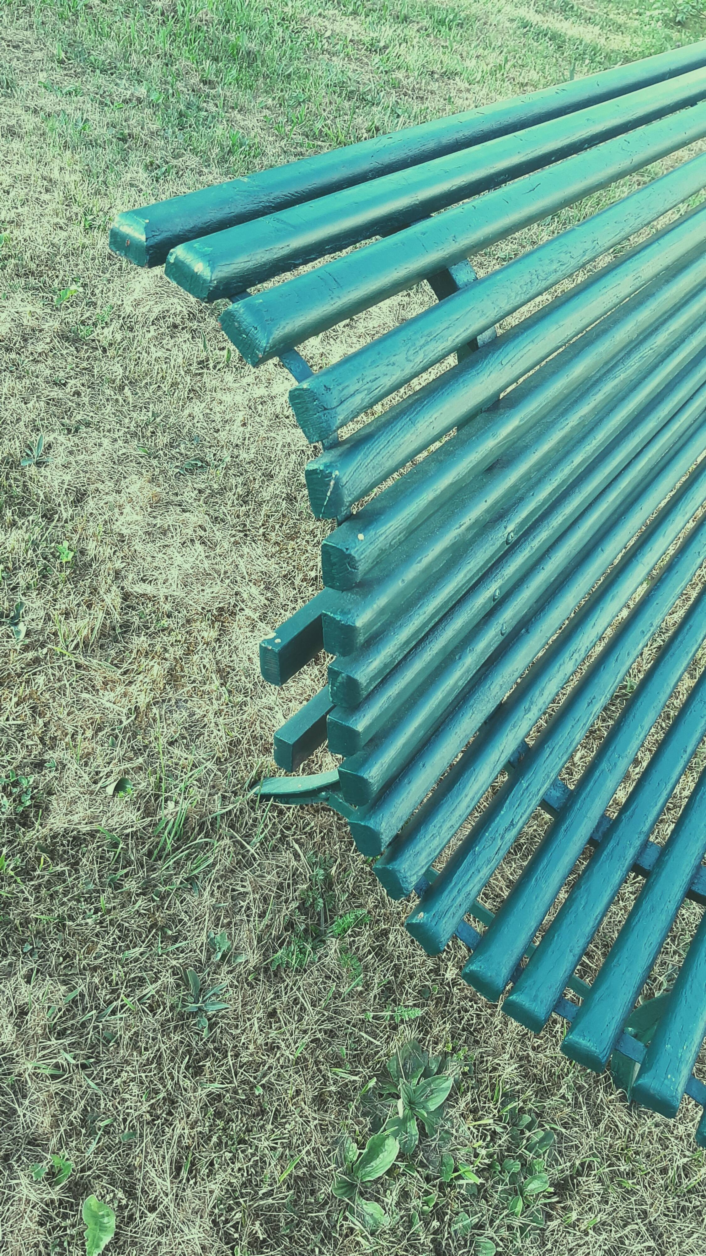 Garden bench with wooden and iron slats
