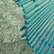 Garden bench with wooden and iron slats