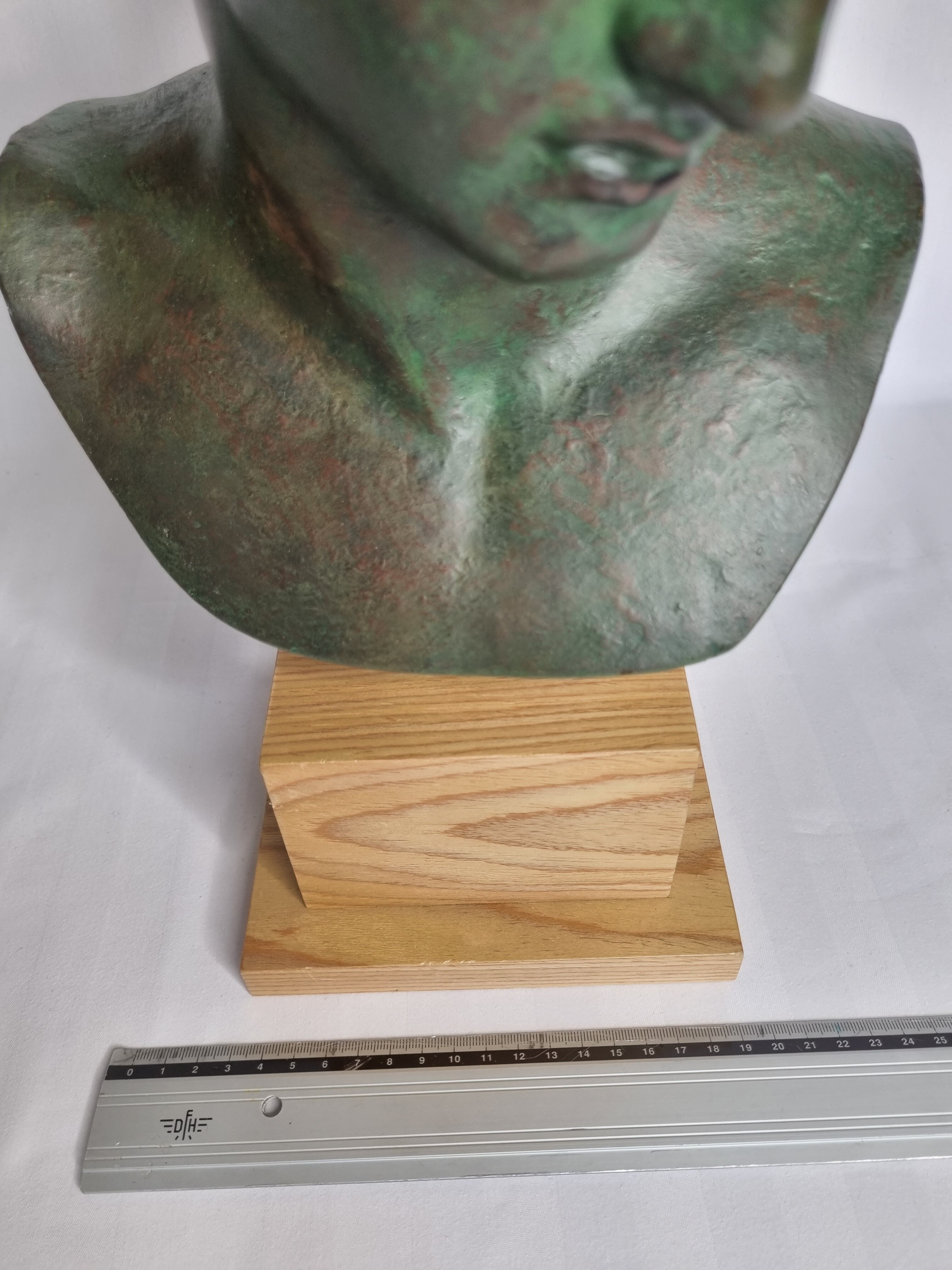 Bust of the Ephebus of Marathon in patinated plaster on base