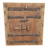 Old wooden tribal window