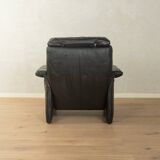 1980s cor armchair and ottoman in black leather