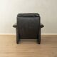 1980s cor armchair and ottoman in black leather