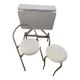 Small stools in metal and faux leather.