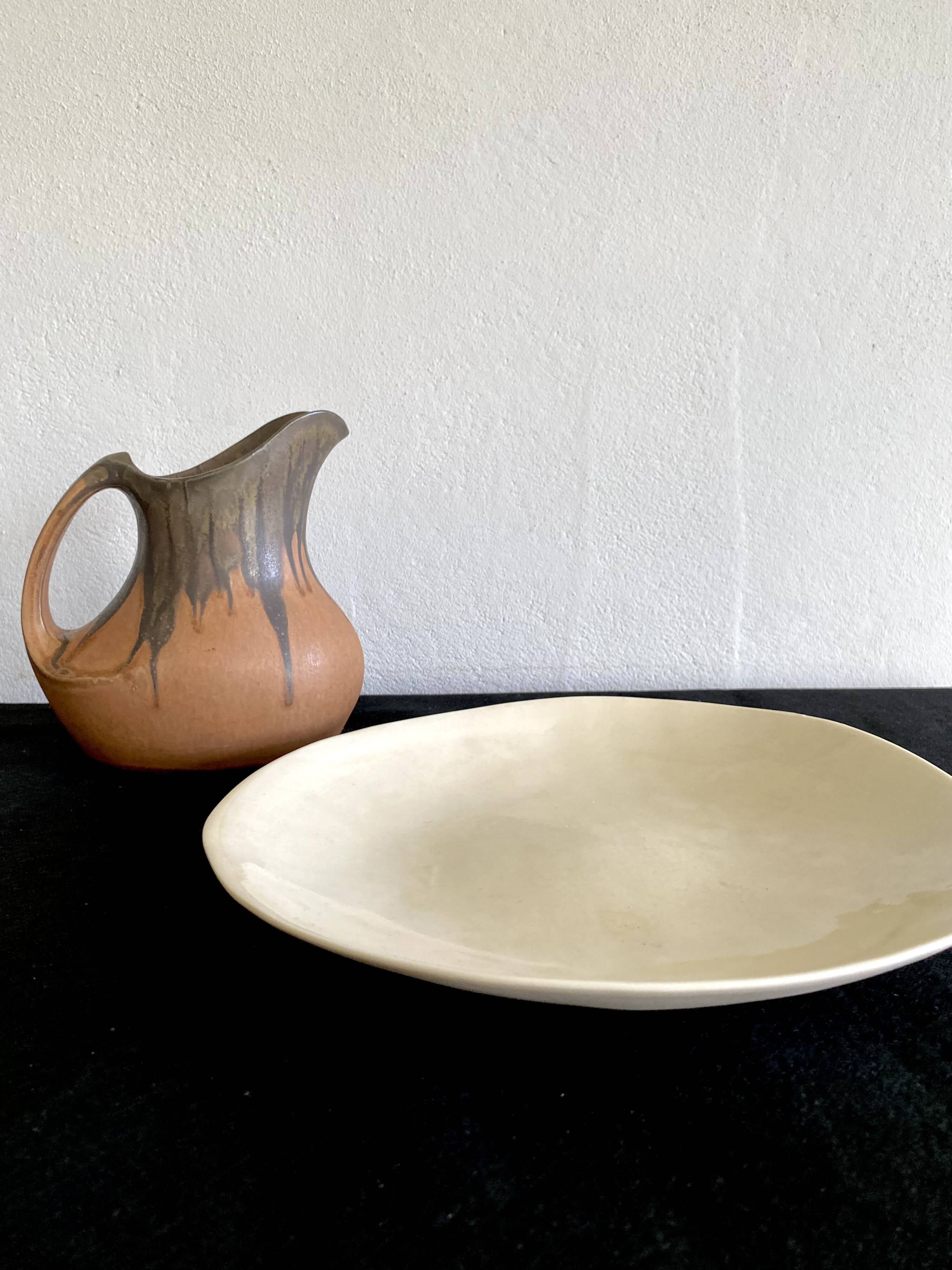 Denbac pitcher, flamed terracotta, 1900