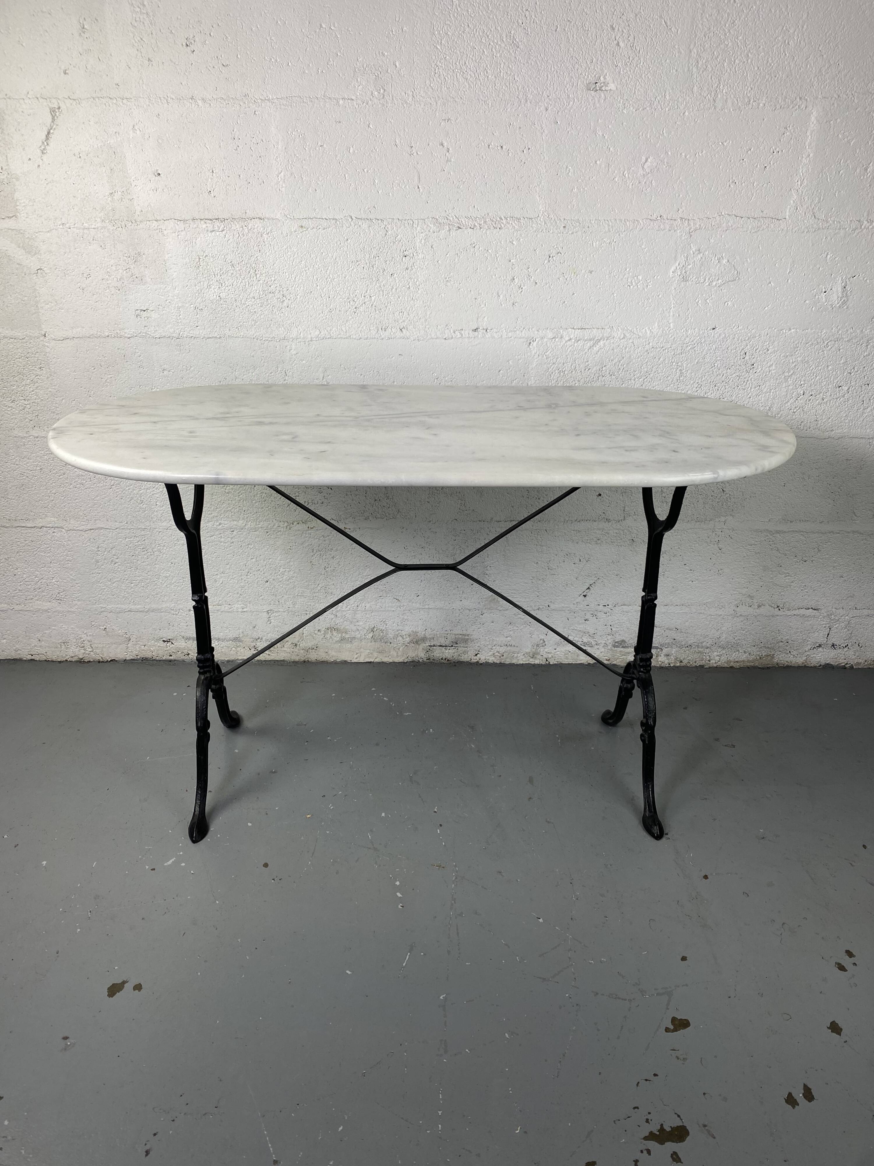 Marble and wrought iron bistro table