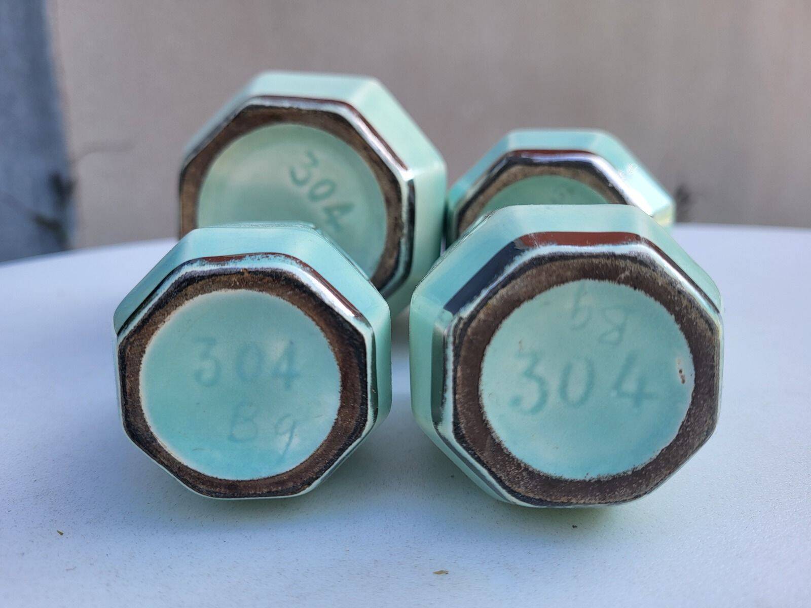 Set of 4 Art Deco celadon green and silver barbotine pots.