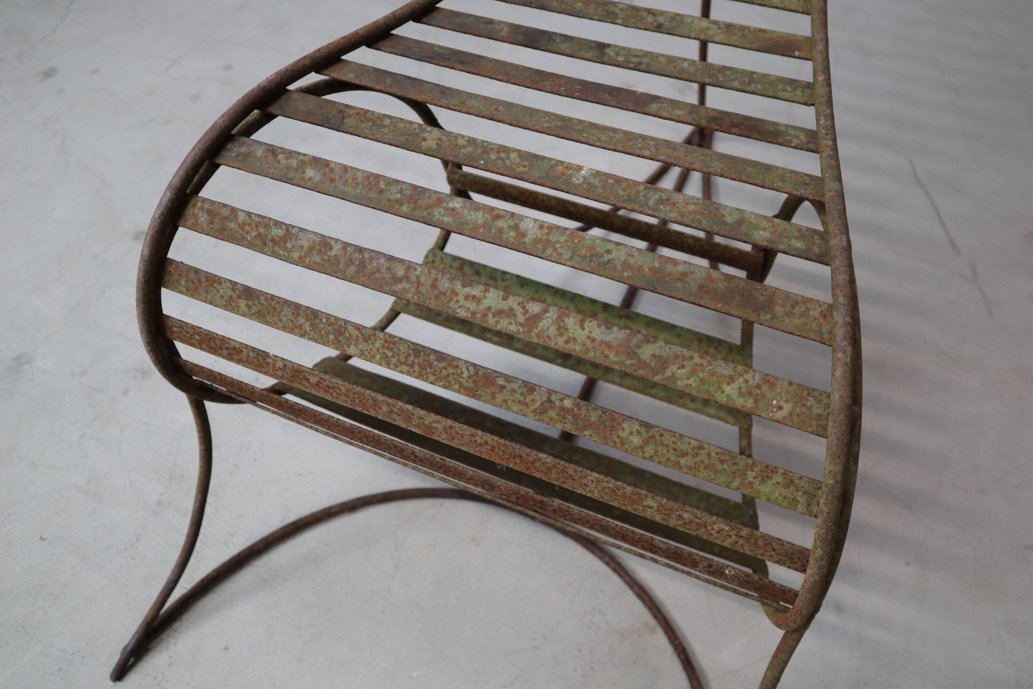 Set of three sculptural iron chairs