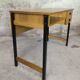 Vintage desk in modernist style made of wood.