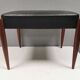 Footstool with teak wood legs and black skai (imitation leather) 1970s