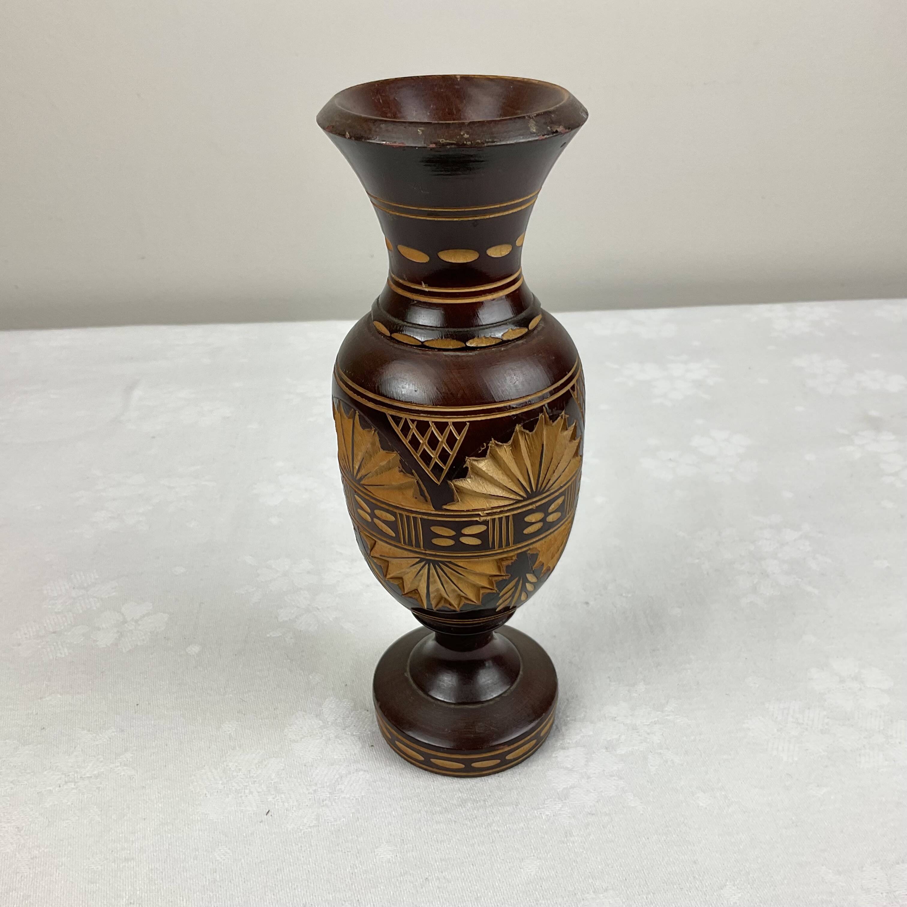 Carved wooden vase