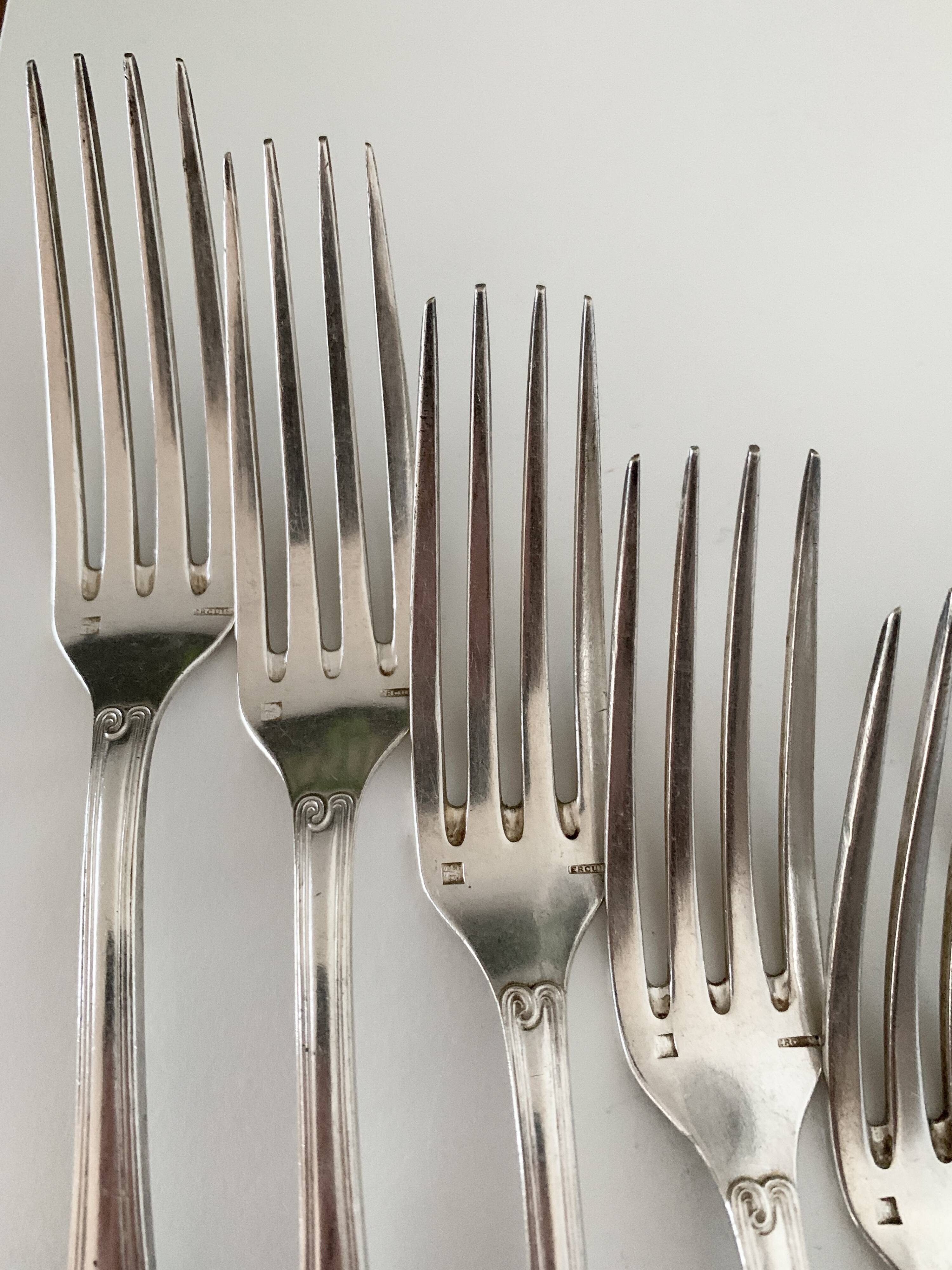 Nine large Ercuis silver-plated forks