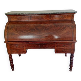 Mahogany cylinder desk from the Restoration period.