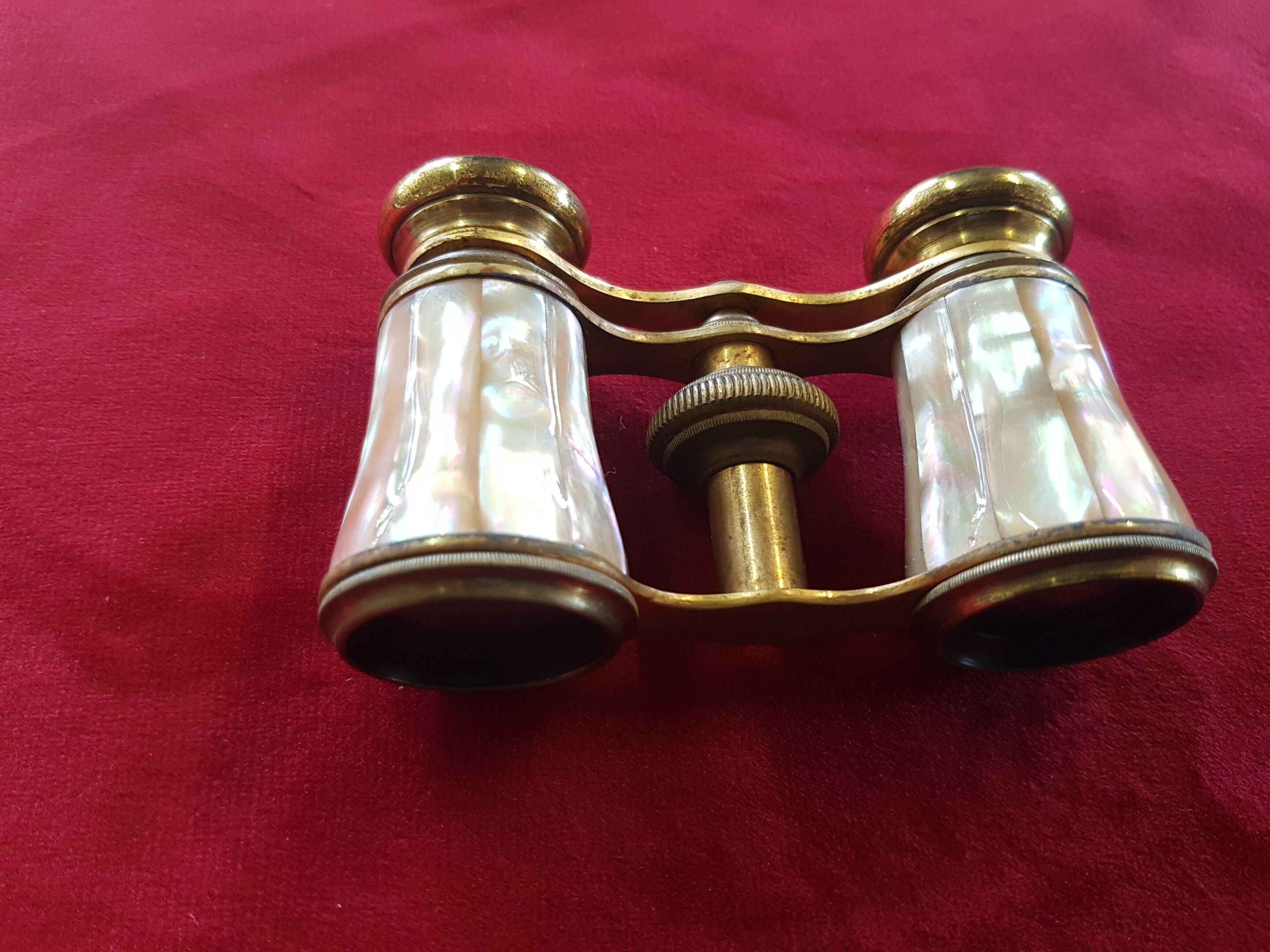 Brass and mother-of-pearl theatre twins