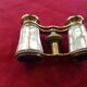 Brass and mother-of-pearl theatre twins