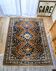 Hand-knotted Persian Shiraz rug in wool with tribal decoration, 300 x 220 cm.