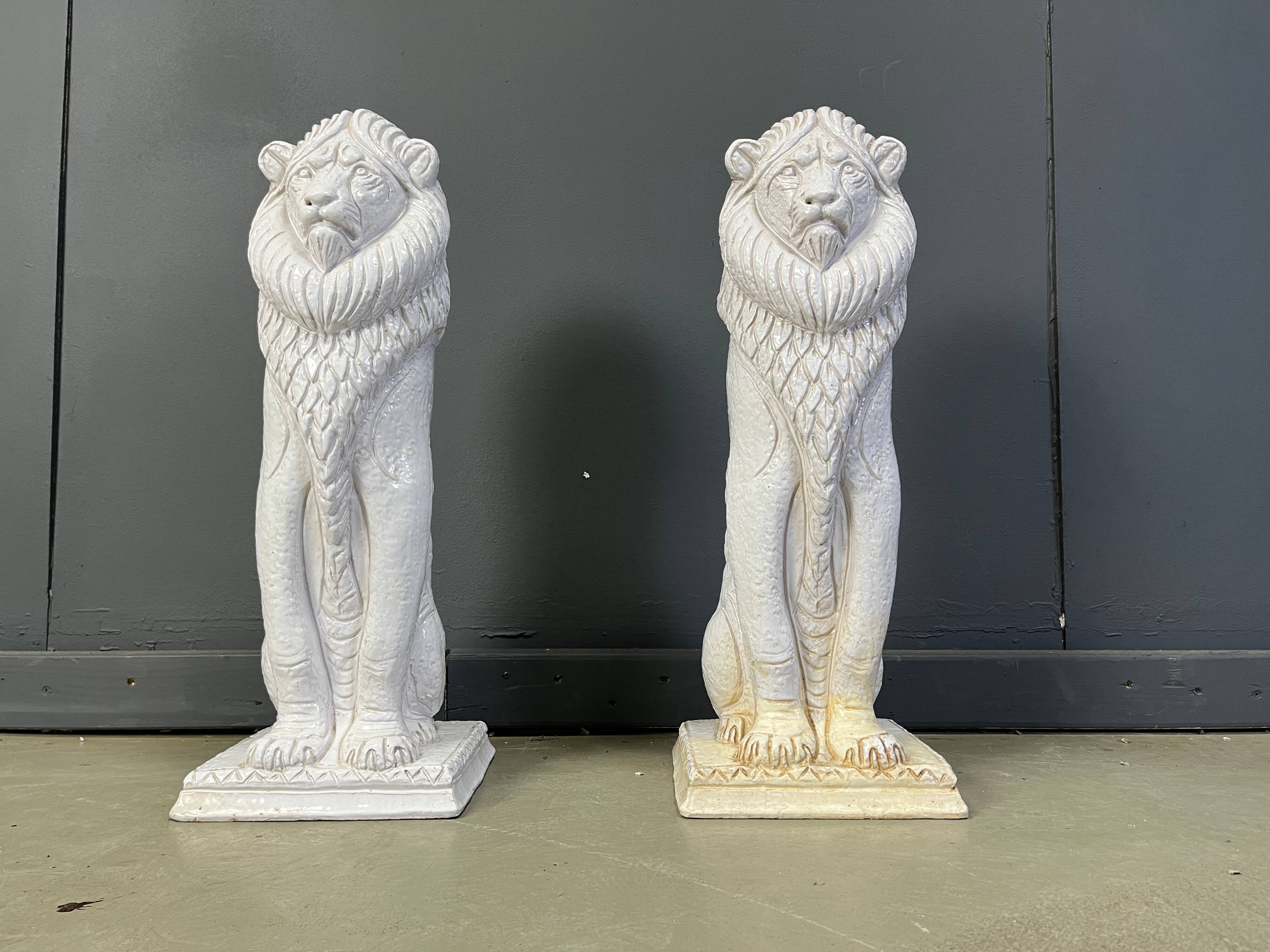 Pair of Renaissance style terracotta lion sculptures, 1950s