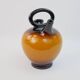 Ochre-orange ceramic jug signed under the base CP Claude Paci