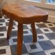 Brutalist tripod stool in solid elm