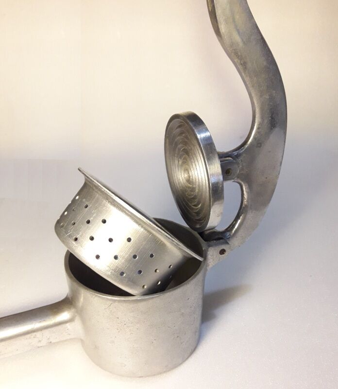 Vintage grapefruit metal citrus press