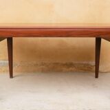 Expandable teak dining table