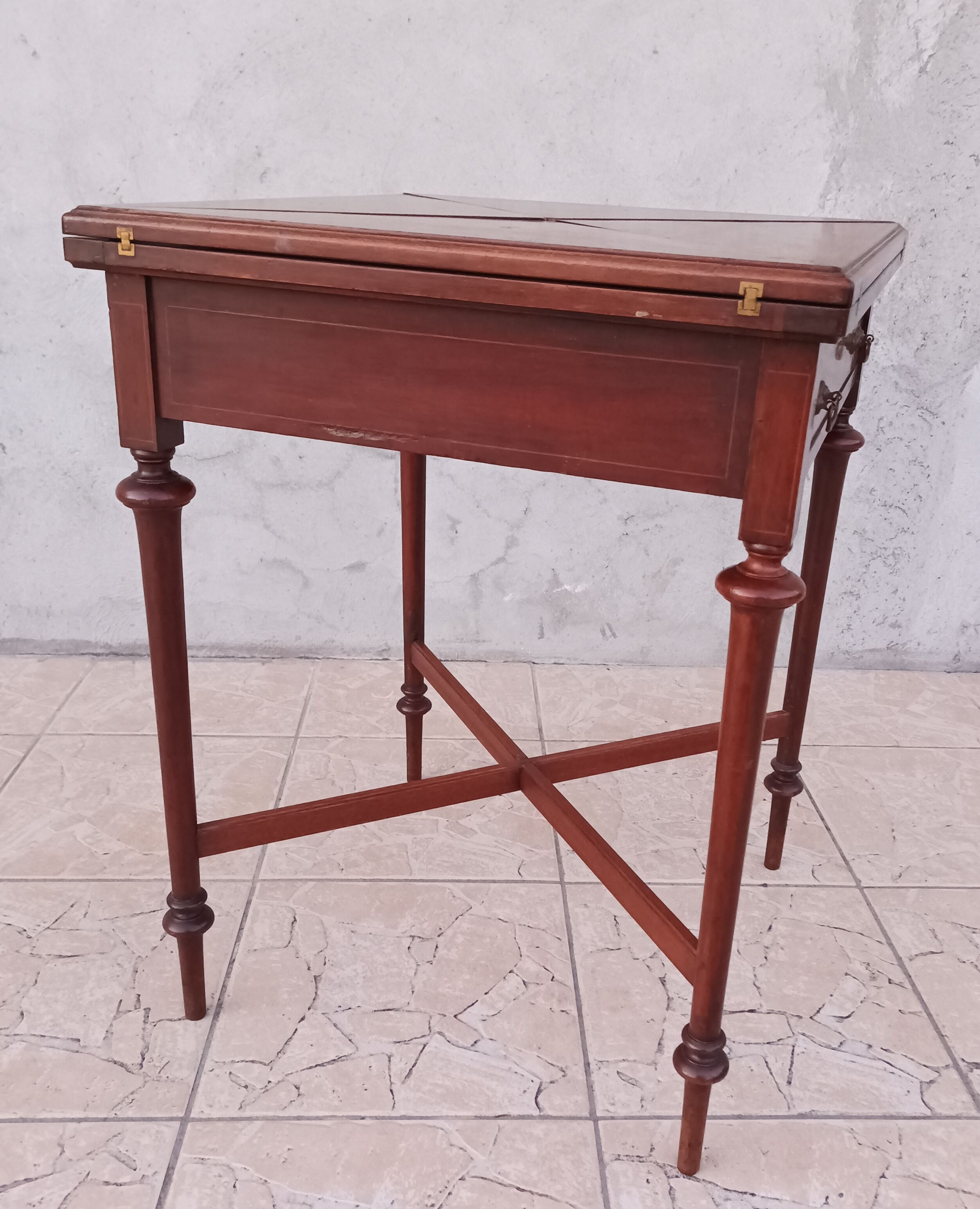 Game table in mahogany late 19th