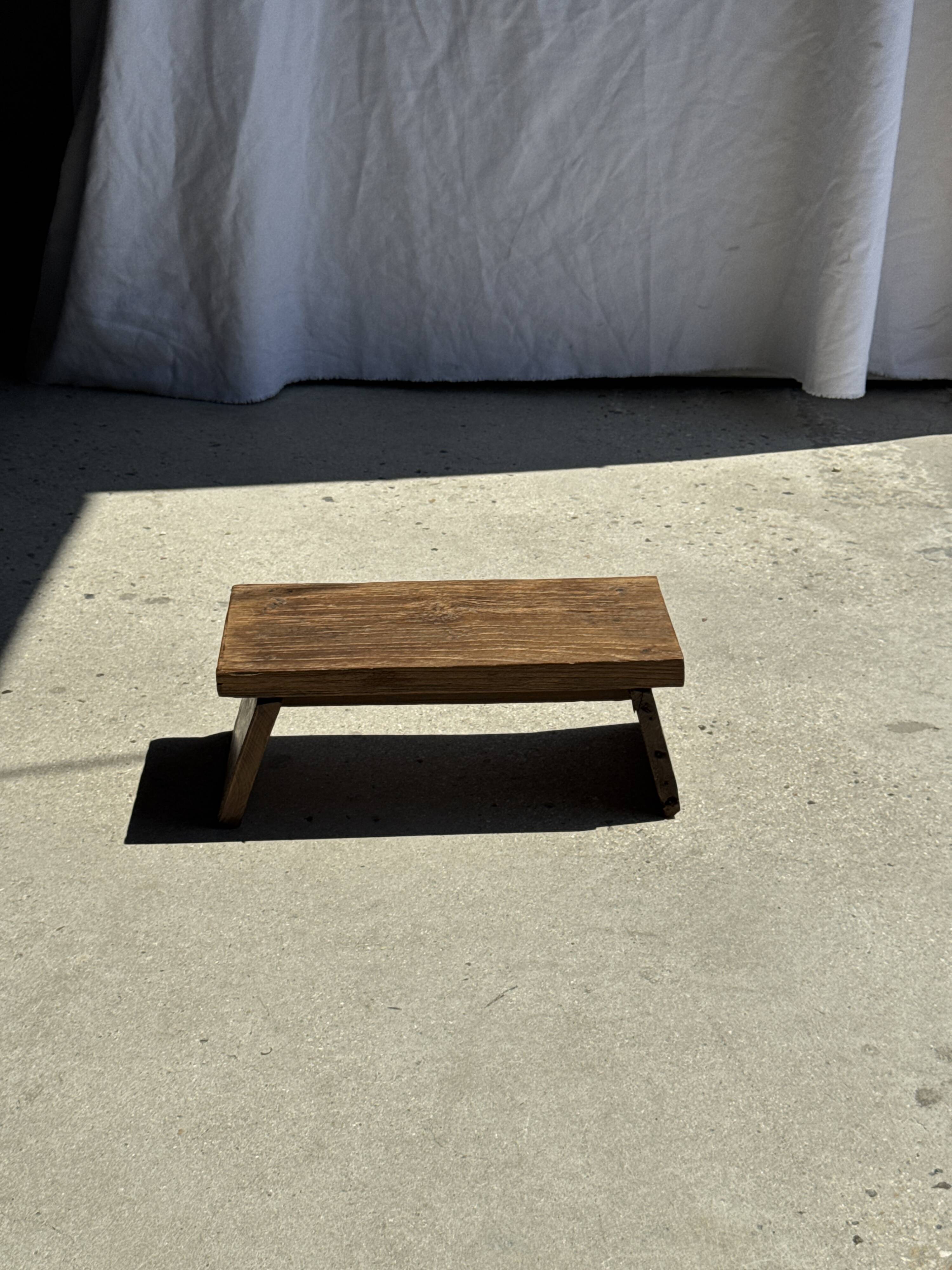 Small low bench in old teak from Indonesia H16 L39