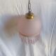 Hanging bell and pink glass garland