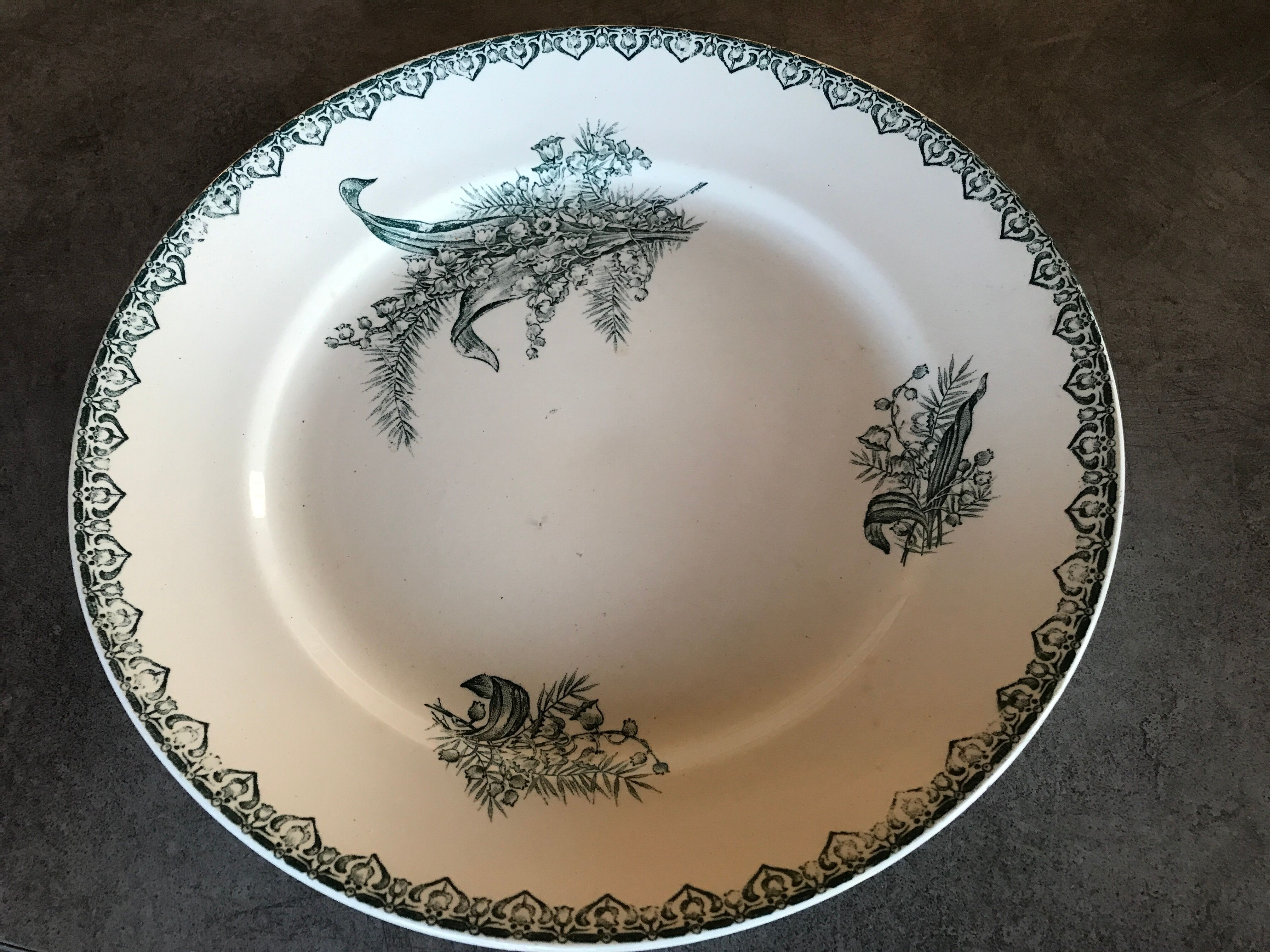 Flat hollow in earthenware st amandinoise st amand model lily of the valley