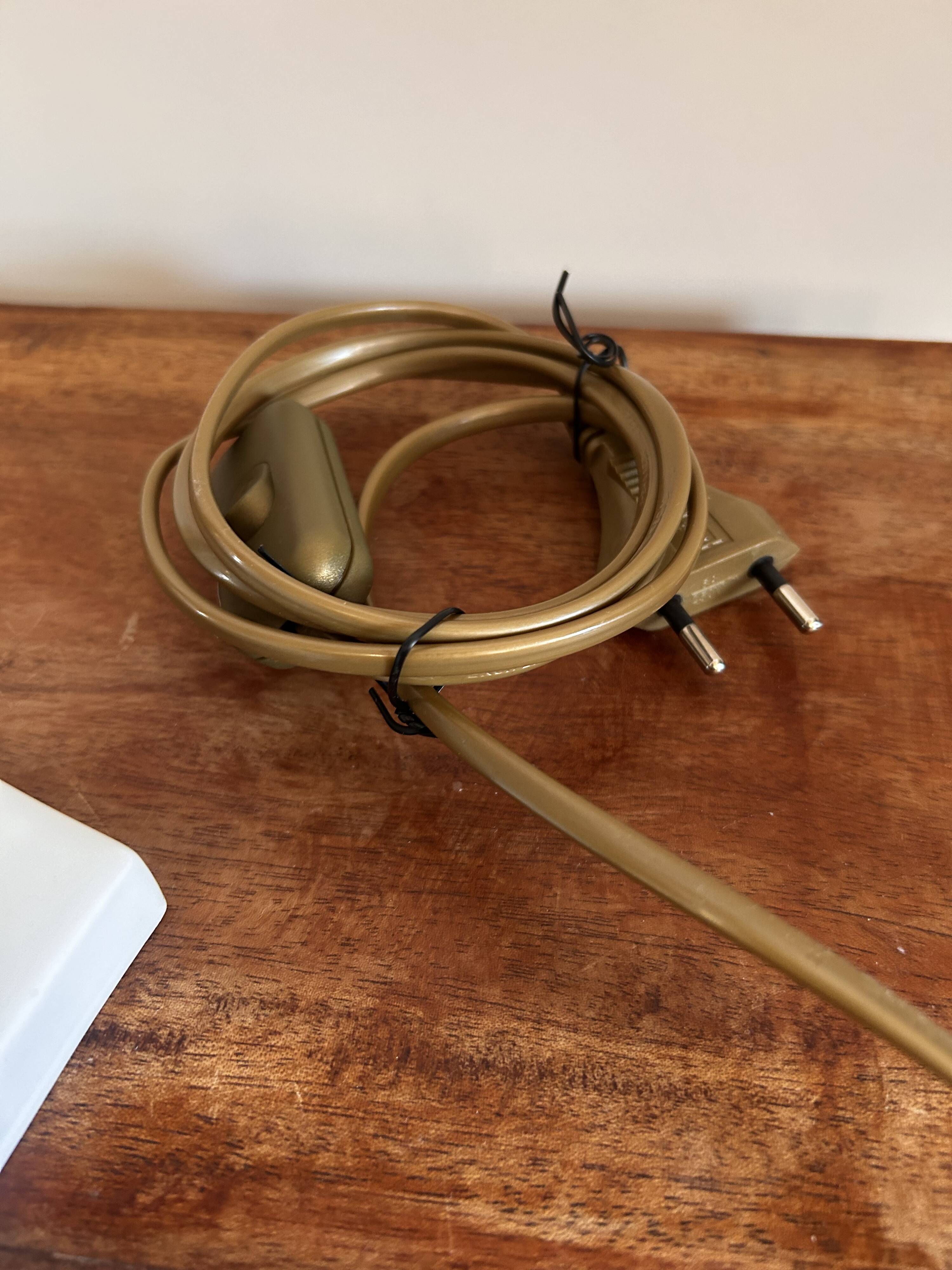 White ceramic table lamp with pastel shade