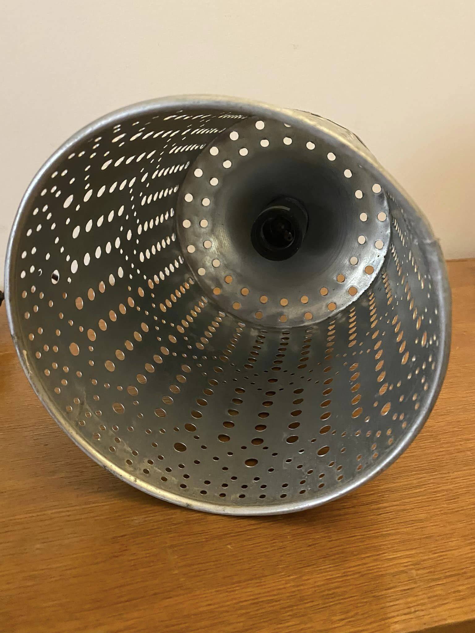 Industrial pendant lamp in perforated gray metal