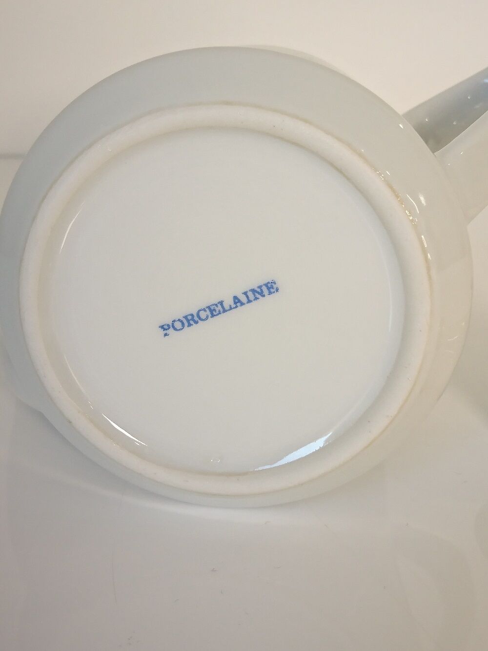 Selfish white porcelain teapot