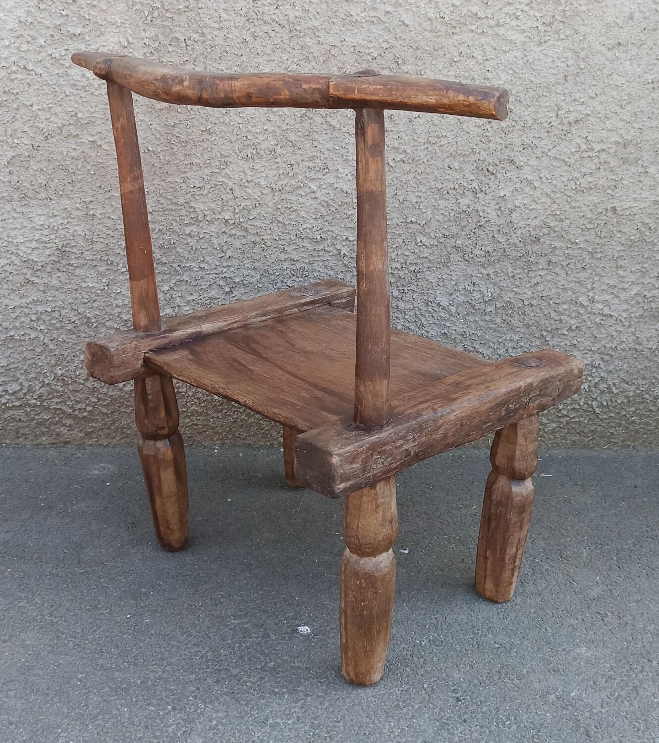 Antique wooden stool. Baoulé African art from Ivory Coast.