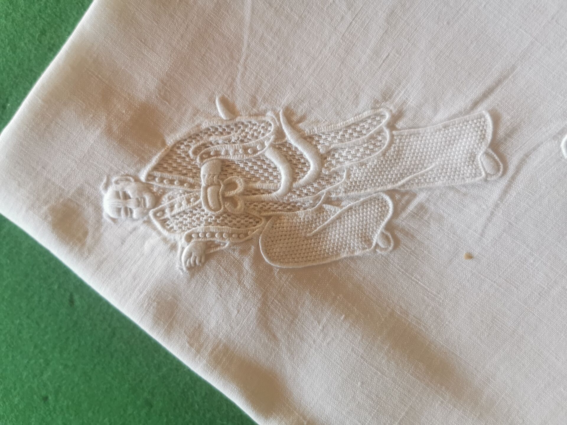 12 old damask linen napkins with a monogram