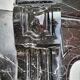 Pompadour fireplace with black marble modillions